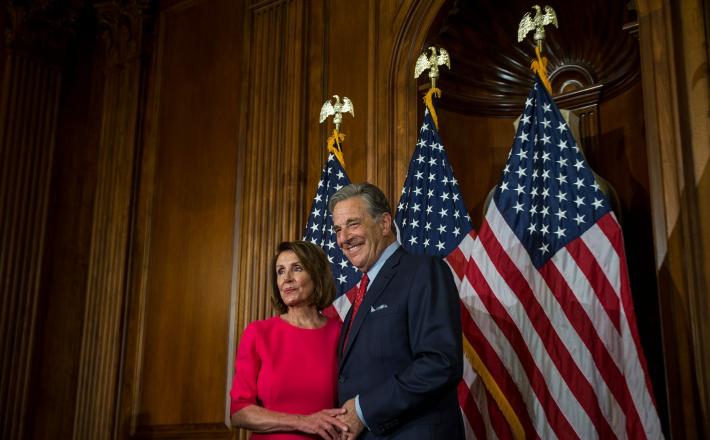 House Speaker Nancy Pelosi poses with her husband, Paul Pelosi, on Capitol Hill. (ZACH GIBSON/GETTY IMAGES)