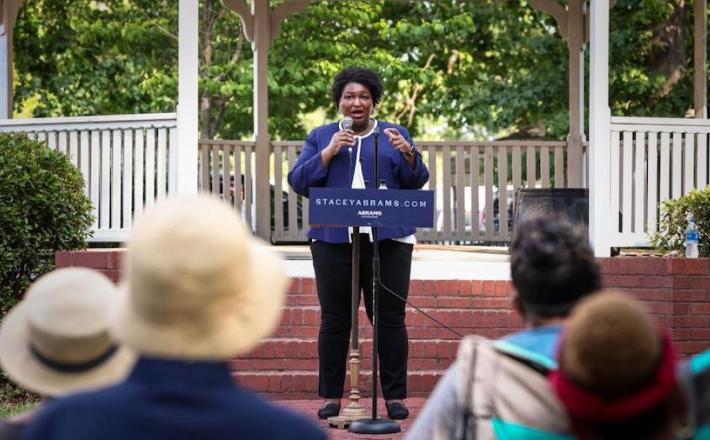 Stacey Abrams, the Democratic gubernatorial nominee in Georgia, speaks during a campaign event in Reynolds on June 4, 2022. Abrams faces GOP Gov. Brian Kemp in the general election in November. (CNN)