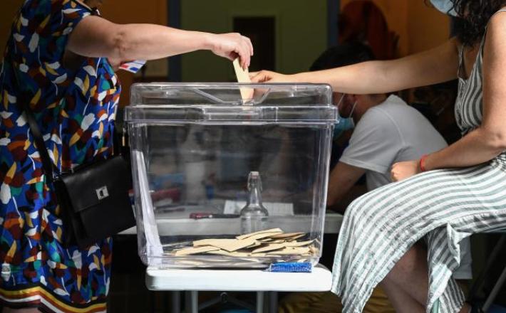 Vote à Lyon le 20 juin 2021 pour les élections régionales. PHILIPPE DESMAZES / AFP