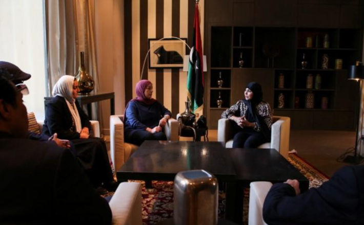 Hunaida Tumia, one of only two women to run in Libya's first presidential election, checks her phone during an interview with Reuters in Tripoli, Libya, on December 1, 2021.REUTERS/Hazem Ahmed Hunaida Tumia, one of only two women to run in Libya's first presidential election, checks her phone during an interview with Reuters in Tripoli, Libya, on December 1, 2021.REUTERS/Hazem Ahmed