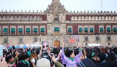 Protesters at a femicide protest in Zocalo, Mexico City, the day after International Day for the Elimination of Violence Against Women in 2019. (Wikimedia Commons)