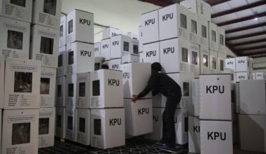 Workers from the Depok General Elections Commission (KPU) stack ballot boxes at a warehouse in Cimanggis district, Depok, West Java, on Nov. 25, 2020.(JP/P.J.Leo)