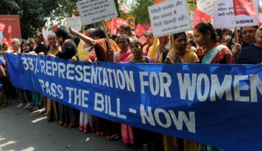 Activists from All India Democratic Women's Association (AIDWA) shout slogans demanding the passing of the Women's Reservation Bill near parliament house in 2011 in New Delhi [File: Raveendran/AFP]