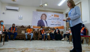 Nada al-Jubori, a candidate in Iraq's upcoming parliamentary elections, speaks to her supporters in Baghdad, Iraq September 9, 2021. REUTERS/Charlotte Bruneau