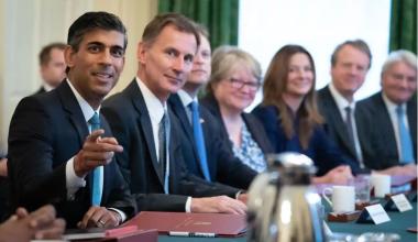 Rishi Sunak (left) at his first meeting of his cabinet. Photograph: Stefan Rousseau/PA 