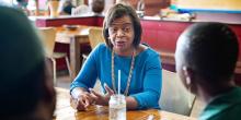 Cheri Beasley, a Democratic U.S. Senate candidate, speaks with the owners of Zwelis, a Zimbabwean restaurant, in Durham, N.C., on July 7, 2021.Getty Images file