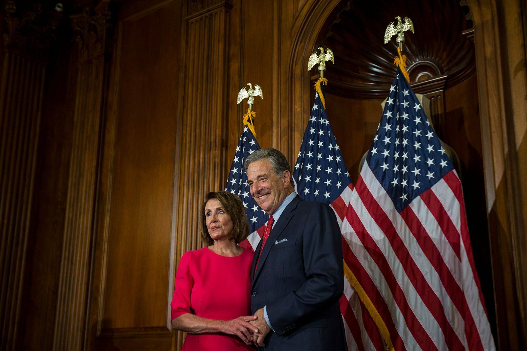 House Speaker Nancy Pelosi poses with her husband, Paul Pelosi, on Capitol Hill. (ZACH GIBSON/GETTY IMAGES)