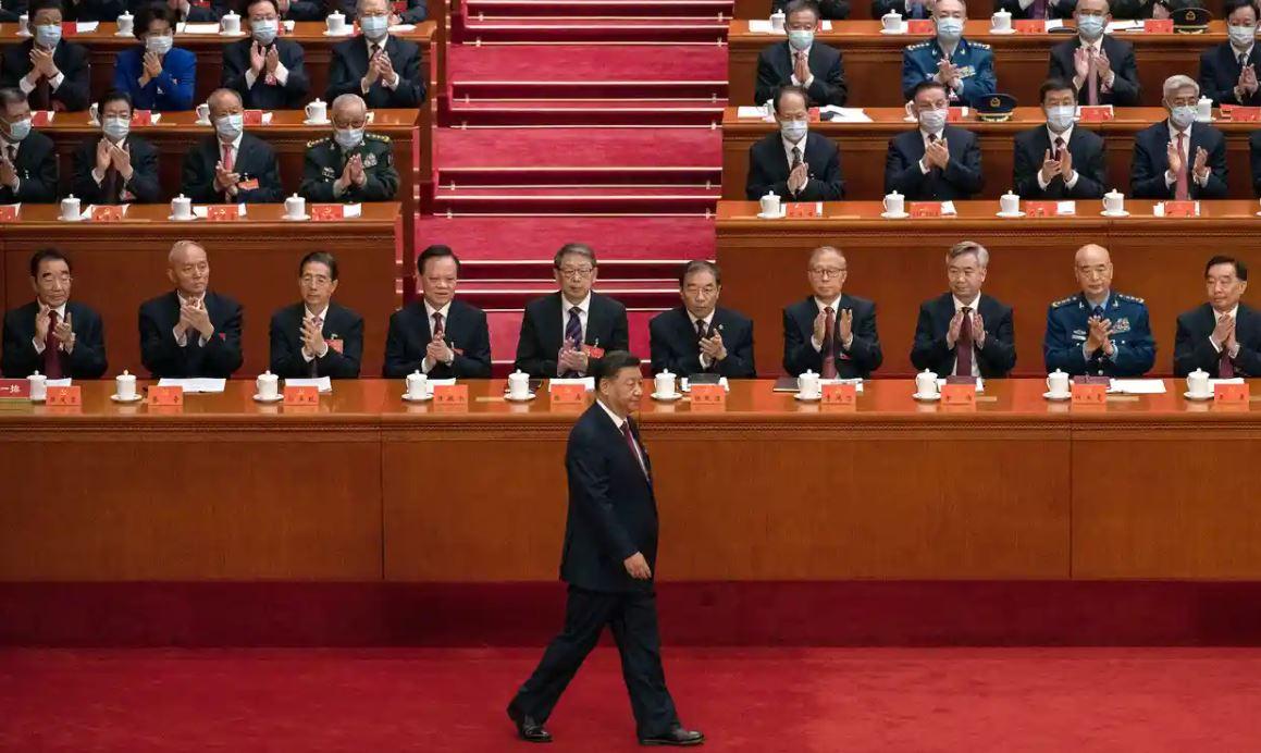 Chinese President Xi Jinping is surrounded by men Photograph: Kevin Frayer/Getty Images