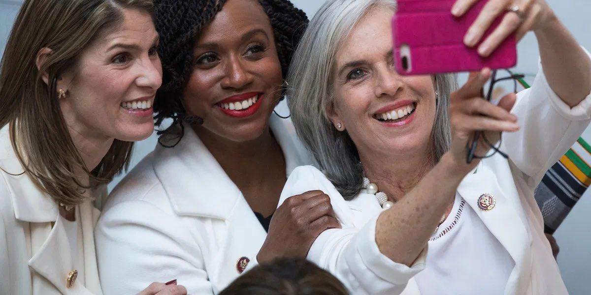 Rep. Ayanna Pressley poses with Assistant Speaker of the House Katherine Clark. (@AyannaPressley / Twitter)
